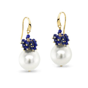 A pair of Australian South Sea Cultured Pearls, 14 mm in size, oval in shape, grade 1 with a AAA luster set on 18 carat yellow gold hooks, with a cluster of 5.6 carats of lapis beads hand wired in 18 carat yellow gold.