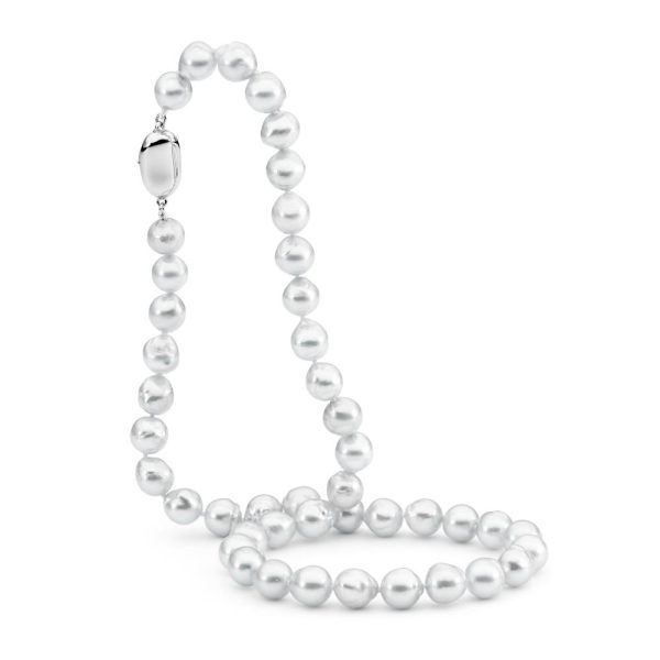 A necklace consisting of beautiful baroque shaped Akoya Pearls, silver- blue in colour, grade 2 with a AAA luster. The pearls graduate in size from 8mm at the back to 9mm at the front. The necklace is fastened with a sterling silver push clasp and strung to the length of 45 cm